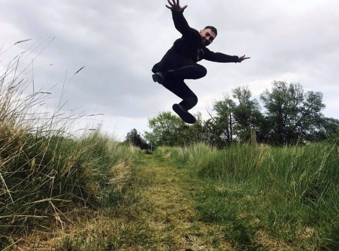 Bank Oliday jumping in a field
